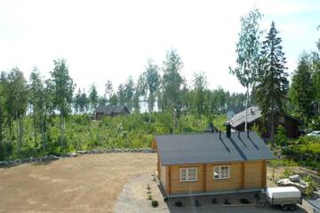 Фото номера Коттедж с 2 спальнями Дома для отпуска Cottage Kivitatti г. Сюсмя 77