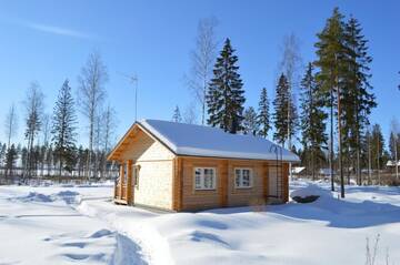 Фото номера Коттедж с 2 спальнями Дома для отпуска Cottage Kivitatti г. Сюсмя 58