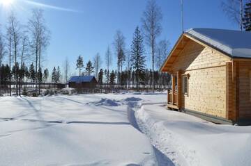 Фото номера Коттедж с 2 спальнями Дома для отпуска Cottage Kivitatti г. Сюсмя 63