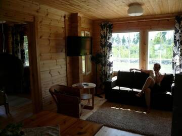 Фото номера Коттедж с 2 спальнями Дома для отпуска Cottage Kivitatti г. Сюсмя 70