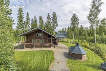 Фото номера Дом с 4 спальнями Дома для отпуска Holiday Home Tattimetsä г. Сюсмя 21